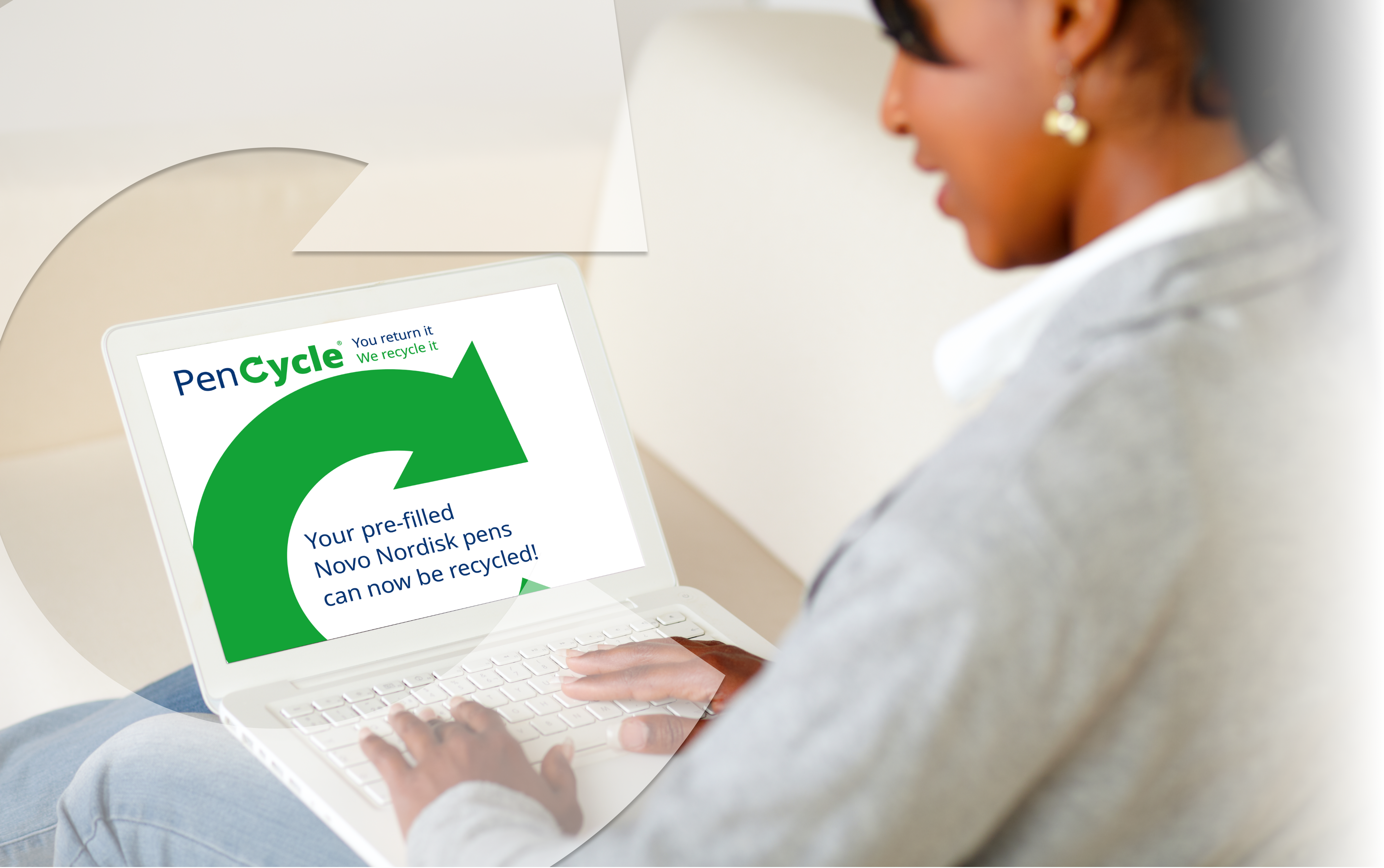 A woman on a laptop looking at PenCycle information.